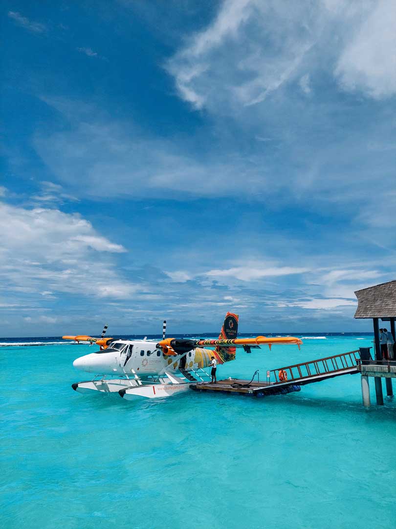 sae plane in tropical setting on water